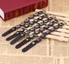 Fábrica de atacado de joias Yiwu venda direta pulseira de pulso de couro de vaca pulseira de couro de coração de pêssego quente pulseira punk