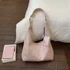 Bolsa Tote Rivet Casual para o Trabalho Nova Primavera Grande Capacidade Estilo Retrô Feminina de Alto Valor Ombro Único Sob o Braço