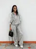 Conjunto de dos piezas informal para mujer, top y pantalón ajustados con lentejuelas, disponible en AliExpress 2023.