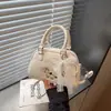 Bolsa Pequeña de Verano de Venta Caliente Transfronteriza para Mujer 2026 Nueva Moda Versátil Bolso Cruzado Bolso de Mano Bolso de Bowling Bolso Almohada