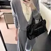 Traje Casual Cuello en V Falso Dos Piezas Suéter de Manga Larga para Mujer 2025 Otoño Pantalones de Pierna Ancha de Cintura Alta Conjunto de Dos Piezas