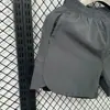 Shorts Esportivos Populares Fitness Respirável Secagem Rápida Masculino e Feminino Soltos para Corrida Shorts de Três Pontos Falso Duas Peças Anti-Exposição