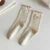 Calcetines calcetines de tubo para mujer primavera y otoño absorbentes de sudor transpirables de algodón calcetines con lazo de oreja de madera calcetines de rizo de hilo de punta japonés al por mayor