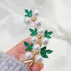 Nuevo broche de aleación para mujer, moderno y de alta gama, pin de lujo nicho para abrigos y trajes, simple y elegante, broche versátil