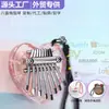 Mini piano de pulgar más vendido transfronterizo, kalimba de cristal acrílico de 8 tonos, instrumento musical tocado con los dedos, adorno colgante popular