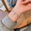 Pulsera de acero titanio Moon Pearl de temperamento súper hada de Corea del Sur para mujer, verano, combina con todo, rojo de internet, joyería de mano al por mayor