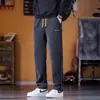 Pantalones casuales para hombre 2026 nuevo otoño e invierno chenilla forrados de polar engrosados holgados de pierna recta de moda pantalones de pana