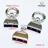 En stock venta al por mayor fábrica directa de llaveros de metal llavero de coche hebilla de anillo de cincha hebilla de conexión accesorios de ferretería