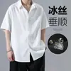 Camisa de verano para hombre, fina, holgada, casual, moderna, elegante, de seda helada para jóvenes, manga corta, versátil, camisa blanca