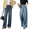 Nuevos estilos de otoño e invierno de pantalones vaqueros de pierna ancha estilo coreano para embarazadas, con líneas de corte diagonales, diseñados para ocultar el vientre, crear un efecto adelgazante y cubrir las caderas, con un diseño de longitud hasta el suelo