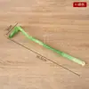 Rascador de espalda portátil de imitación jade de nueve dientes para masajear meridianos y rascar sin necesidad de ayuda