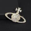 Broche Saturno Transfronterizo Europeo y Americano para Mujer Diamante Flash Refinado Planeta Corsage Nicho Diseño de Alta Gama Pin Accesorios para Traje