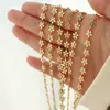 Moda europea y americana flor dorada gota azul aceite collar titanio acero plateado 18K oro pulsera traje nicho lujo ligero fresco