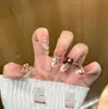 Parche de uñas francesas de alta calidad con diseño de explosión, con diamantes de imitación para llevar a mano, acabado con 30 piezas extraíbles.