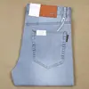 Calças de moda masculinas retas finas slim azul claro para primavera e verão, fibra de poliéster stretch, jeans