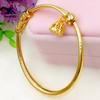 Brazalete de latón bañado en oro tipo push-pull de boutique, joyería para bodas de imitación de oro, fabricantes directos, brazalete de loto de vientre redondo liso