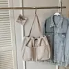 Bolsa tote grande de estilo coreano para mulheres, novo modelo de verão 2026, bolsa de mão simples de cor sólida, bolsa de ombro de veludo cotelê