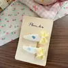 Nuevo Pasador Ovalado a Cuadros Estilo Coreano Botón Estampado Clip para Flequillo Roto Lateral de Niños Clip con Borde de Flor de Lazo