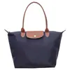Bolso tote nuevo de gran capacidad para mujer 2026, bolso de hombro de nailon para ir al trabajo, moderno, simple, versátil y con un toque de alta gama