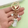 Llavero Colgante de Aleación de Gato Lindo Transfronterizo Colgante de Bolsa de Metal para Mujer Luna Gato Estrella de Cinco Puntas