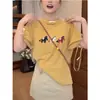 Camiseta feminina popular estilo 2026 Ano do Cavalo, manga curta, gola redonda, ombros retos, versão coreana, moderna, versátil, rejuvenescedora, top 100% algodão
