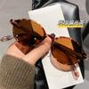 Nueva versión coreana de gafas de sol de montura redonda pequeña con montura de calle sencilla, de red roja, con lentes de sol de gran sentido.