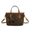 Bolso de mano tipo cubo para mujer, modelo nuevo 2026, bolso tote pequeño de alta costura, versátil bolso de hombro y cruzado