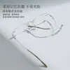 Armazón de anteojos sin montura, estilo cat-eye fresco y sofisticado, de montura estrecha de titanio con memoria y plaquetas nasales de silicona, apto para lentes de prescripción, venta al por mayor Danyang