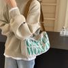 Bolsa de lona da moda internacional, bolsa de ombro estilo coreano para estudantes, bolsa tote com estampa de letras, bolsa transversal versátil, elegante e simples