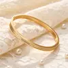 Pulseira de aço titânio com ranhura escovada cravejada de diamantes para mulheres, pulseira com fecho de segurança banhada a ouro 18K, atacado de um fabricante de joias de luxo transfronteiriço