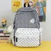 Mochila dulce con estampado estilo coreano para estudiantes de secundaria y preparatoria, con un diseño de ribete de encaje femenino, para uso transfronterizo.