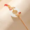 Pulsera de Cuerda Roja Koi Buena Suerte para Mujer Lujo Ligero Gama Alta Estilo Caliente Estilo Chino Hebilla de Paz de Jade Hetian Pulsera de Cuentas de Transferencia