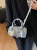 Bolsa de Mão de Moda Transfronteiriça com Laço Design Cilíndrico para Mulheres, Novo Estilo Verão 2026, Pingente de Espelho Personalizado, Bolsa de Ombro Único Transversal
