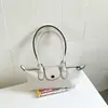 Bolso tote de estilo francés con nicho y asa larga, nuevo diseño de moda, bolso baguette de alta calidad, moderno y versátil, perfecto para llevar debajo del brazo