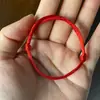 Pulseira de Corda Vermelha Nova da Moda Tecida à Mão com Contas Redondas para o Ano da Vida