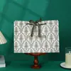 Caja de regalo bolsa de regalo bolso de mano bolsa de papel rectangular bolsa de embalaje para compras de ropa impresión recuerdo