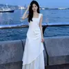 Vestido irregular estilo vacacional para mujer, nuevo modelo 2026, blanco, entallado en la cintura, vestido largo de verano