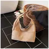Bolsa feminina grande de couro fosco retrô, nova bolsa de ombro única para mãe e filha outono/inverno 2026, bolsa tote texturizada para trabalho e deslocamento