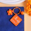 Feliz Día del Maestro Tarjeta Llavero Regalo Acrílico Doble Cara Texto Melocotón y Ciruela Alrededor del Mundo Decoración Colgante para Bolso Regalo