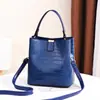 Bolso tipo cubo para mujer 2025, gran capacidad, texturizado, nuevo bolso de mano elegante y con estilo, diseño de piedra, bolso de hombro, bolso cruzado