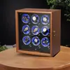Cargador de relojes vertical de alta gama de madera de nogal con nueve ranuras, pantalla táctil, luz LED y funcionamiento silencioso