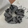 Goma de pelo satinada estilo coreano para mujer, nuevo modelo 2026 con sensación de alta gama, coleta elástica estilo perezoso, accesorio para el cabello de alta elasticidad
