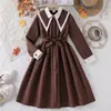 Ropa para Niñas Nueva de Comercio Exterior Otoño 2026, Vestido Infantil para Niños Mayores, Vestido de Princesa Transfronterizo con Cuello Solapa, Cintura Fruncida, Patchwork