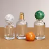 Botella de Perfume de Bola de Resina Redonda Personalizada de Colores Botella de Spray de Vidrio Grueso Cilíndrica Botella Vacía Transparente Sellada Tipo Pulsador