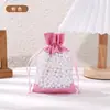 Bolsas de imitación de lino compuestas con cordón en stock, bolsas de lino con cordón para joyería y empaque de regalos, bolsas de almacenamiento de lino al por mayor