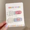 2026 Nuevo Pasador de Pelo de Dibujos Animados Pasador de Pelo Dulce con Lazo Pinza Lateral Exquisita de Gama Alta Pinza de Pato