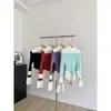 Suéter de Punto con Cuello de Lazo y Mangas de Campana de Bloques de Color para Mujer Invierno 2025 Nuevo Estilo Coreano Volantes Delgado de Punto de Punto Moderno