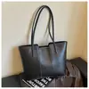 Bolso de Estilo Coreano Transfronterizo para Mujer 2026 Nuevo Bolso de Hombro Único Simple Retro Bolso Tote Texturizado para Clase y Viaje