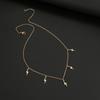 Venta al por mayor de cadena de cuello con lentejuelas y temperamento retro transfronterizo de Europa y Estados Unidos, collar con colgante de luna y estrella Joker simple para mujer