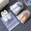 Bolsa de almacenamiento para zapatos de viaje bolsa con cordón en blanco cordón negro bolsillo con cierre de cordón explosión de Amazon a prueba de polvo y humedad